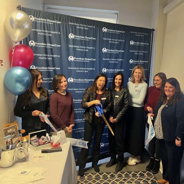 The Freedom Home Care team celebrates expanding home care in Northern Illinois with a ribbon-cutting ceremony