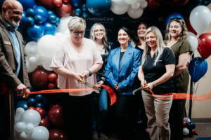 The Springfield team cuts the ribbon at their new office